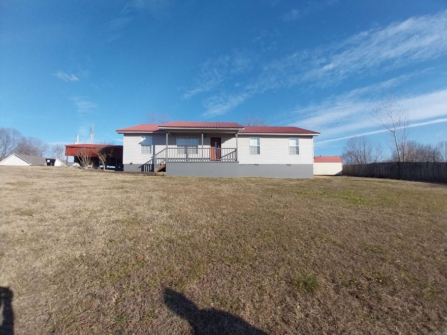 WELL MAINTAINED 4 BEDROOM, 2 BATH HOME!  Located in a family friendly neighborhood, you'll love the layout of this 1,456 sf home.  The interior of this home features a split floor plan, vaulted ceiling in the living room, spacious kitchen/dining combo, master bedroom with attached bath and walk-in closet.  Exterior features a covered deck, storage building and a partial wooden privacy fence.  Very desirable home in a great location!!