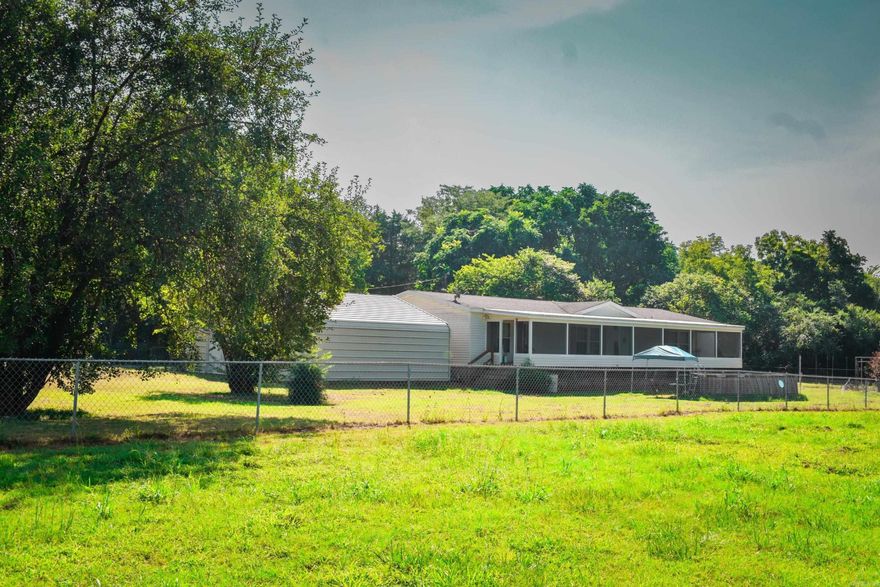 A spacious 3-bedroom, 2-bathroom residence situated on 3.5 acres of land in Clinton.  This property boasts extra rooms, outbuildings and an expansive workshop, providing both ample space and privacy.  With plenty of room to roam, it's an ideal haven for those seeking tranquility and the freedom to explore!