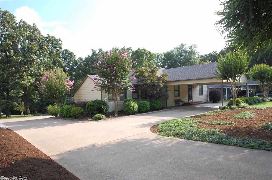 Older home that has been expanded & completely remodeled. Main level has 2 bedrooms plus the master. Large kitchen with dining area. Living room, office, hobby room & utility room. Downstairs there is a gameroom/den plus 2 additional rooms. Deck off of the kitchen & dining area plus a screened in porch. Oversized lot with large shaded back yard. Circle drive in front w/ 1 car carport. See the inside of this one! Hardie board exterior siding. New roof 2013. New backyard privacy fence to be installed soon!