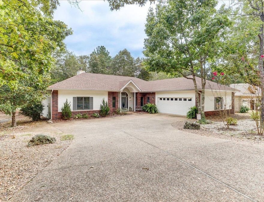 Beautiful Golf Course Home on Isabella – Sought-After East Side of Hot Springs Village!  Discover this immaculate 3-bedroom, 2-bath home perfectly positioned on the Isabella Golf Course, just minutes from the East Gate of Hot Springs Village. Designed for comfort and easy living, this home features a bright open floor plan with seamless flow between the living room, dining area, office, kitchen, and sunroom—all with golf course views.  Enjoy relaxing or entertaining in the spacious sunroom, surrounded by windows that frame the lush fairway, or step through the French doors onto your private deck for morning coffee or evening sunsets.  The oversized primary suite offers double closets, French doors overlooking the course, and a luxurious en suite bath with a jetted tub, walk-in shower, and double vanity. The guest wing includes two additional bedrooms and a full bath, providing privacy for family or guests.  Outside, you’ll love the fenced yard, low-maintenance landscaping, and plenty of space to entertain. Sit back and watch your neighbors play a round—or grab your clubs and join them!