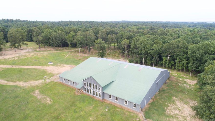 46.37 Acres with Indoor Arena | Piggott, Arkansas | Clay County Price: $800,000 Step into a rare opportunity in Clay County — approximately 46.37 acres of fully fenced land just outside of city limits in Piggott, Arkansas. This property is a dream for horse enthusiasts, hobby farmers, or anyone looking for peaceful country living with premium amenities already in place. At the heart of the property stands a massive 120x114 indoor arena, complete with:  • 6 livestock stalls  • Entertaining/lounge area  • Water and 3-phase electric  • Extremely well-insulated front section with drywall – perfect to convert into living quarters just steps from your arena. The arena’s front offers panoramic views that will stop you in your tracks. Whether you’re riding, relaxing, or entertaining, the setting is truly one of a kind. The land itself is teeming with wildlife — loaded with deer and turkey, and the ground has never been hunted. It’s as pure and peaceful as it gets. A tremendous amount of work and love has gone into building and maintaining this property. When you buy this place, you’re not just buying land — you’re inheriting a piece of the owner