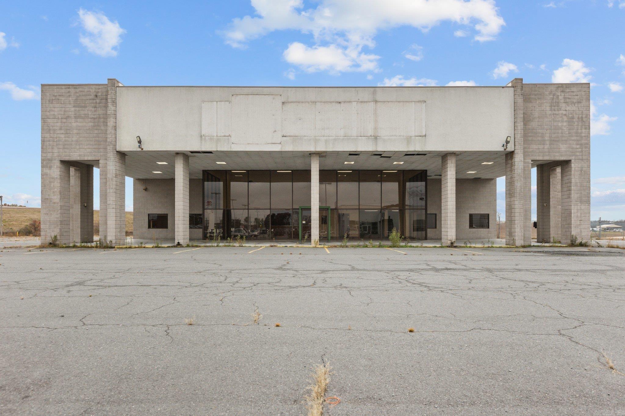 THIS VERSATILE FLEX BUILDING AT 3110 AUTO DR., PINE BLUFF, AR. offers 15,064 square feet of adaptable space, including a showroom area, offices, storage area, and extraordinary large shop with 3 roll up doors, and another work area with a 4th roll up door to accommodate various business requirements. Positioned on a generous 6.727 acre lot with a phenomenal amount of traffic passing daily, this property presents an amazing opportunity for a business seeking a strategic location with room for expansion and efficient operations for a successful business!! INVESTMENT HIGHLIGHTS* *PRIME COMMERCIAL PROPERTY IN PINE BLUFF, AR. * ONLY 1 MILE TO HIGHWAY 65 S, AND 1.5 MILES TO I-530, THIS LOCATION IS PRIME WITH HIGHWAY AND INTERSTATE VISIBILITY. * FULLY AIR CONDITIONED OFFICE SPACES AND HEATED SHOP AREA. * FULLY FENCED AREAS AND GATED ENTRANCE * THE 2ND PARCEL IS 2 ACRES THAT COULD BE UTILIZED FOR EXPANSION. Don't miss this once in a lifetime opportunity to invest in Pine Bluff's thriving future. Contact us today for more details or to schedule a viewing.