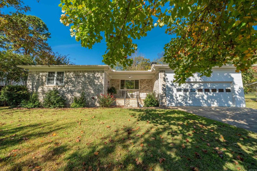 Beautifully Remodeled Home with Shop & Deeded Boat Slip in Lakeside School District!  This stunning 3-bedroom, 2-bath home offers modern updates, thoughtful design, and an unbeatable location in the highly desirable Hwy 7 South area—just minutes from everything Hot Springs and Lake Hamilton have to offer.  Step inside to find a fully remodeled interior featuring new insulation, energy-efficient windows, fresh paint, gorgeous granite countertops, and all-new appliances. The open-concept layout creates a warm and inviting flow from the living area to the stylish kitchen—perfect for entertaining or relaxing with family.  Enjoy outdoor living at its best on the spacious deck overlooking newly landscaped grounds, complete with a well pump irrigation system to keep your yard lush year-round. A heated and cooled shop provides the ideal space for hobbies or a home business, while an additional storage building adds convenience and functionality.  Other features include a two-car garage, plenty of parking, and best of all—your own deeded boat slip, giving you direct access to the lake lifestyle you’ve been dreaming of.  Located in the top-rated Lakeside School District.