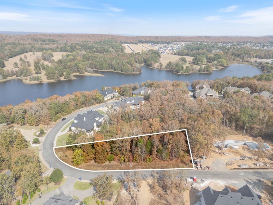 .82 acres, in town on Conway Corp! This is a great location in the sought after Spencer Mountain at the Lake Subdivision. 3000 sq ft min - surrounded by gorgeous homes.... on two lots combined- could split into two if desired.