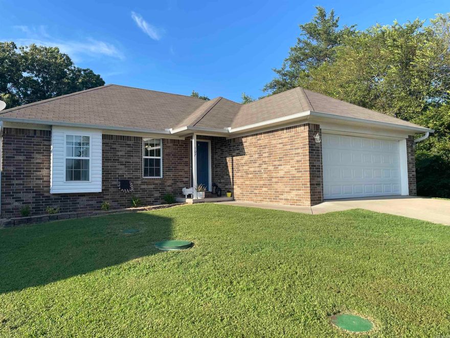 Looking for your first home? This is it in the town of Rose Bud, AR.  This 3 bedroom, 2 bath, 2 car garage home is on the market!  Vaulted ceiling in the master bedroom, great closet space in master bath and throughout the house.  Has a plug in for a camper as well.  Combination chain link and wood fence in back yard of property.  Carpet and tile throughout the house.  Convenient location to town of Rose Bud and not far from schools.