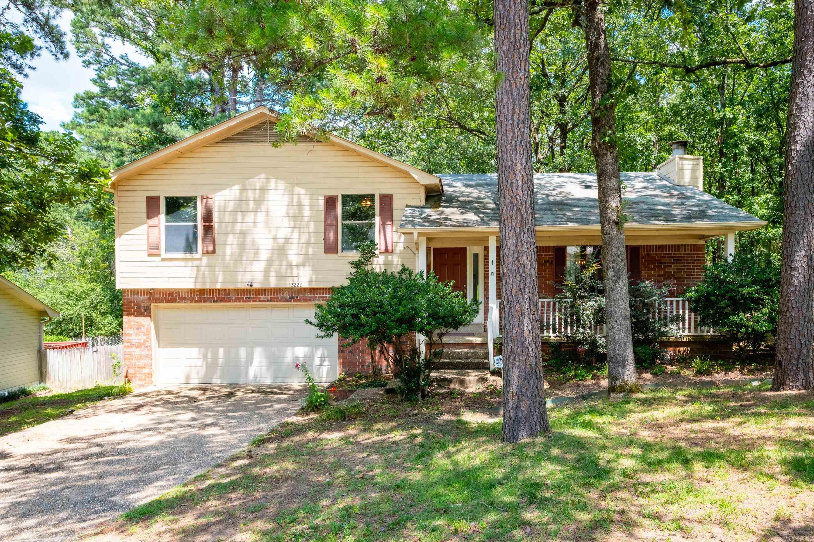 Move-in ready home on 1/2 acre in the heart of WLR! This home welcomes you with a large great room w/ vaulted ceilings and a wood-burning fireplace, separate dining room, eat-in kitchen with granite countertops and stainless appliances - refrigerator and microwave stay! Three spacious bedrooms and two full bathrooms are all on same level. Downstairs leading to garage is the laundry room and another room that can be used as an office, craft room or additional storage! All neutral paint throughout. Backyard is park-like and large with a deck for entertaining! Oversized two-garage. Roof 2016, furnace 2023, AC 2014 and water heater 2020. Zoned for Roberts, Pinnacle View and Central. Come see this precious home on a quiet street!