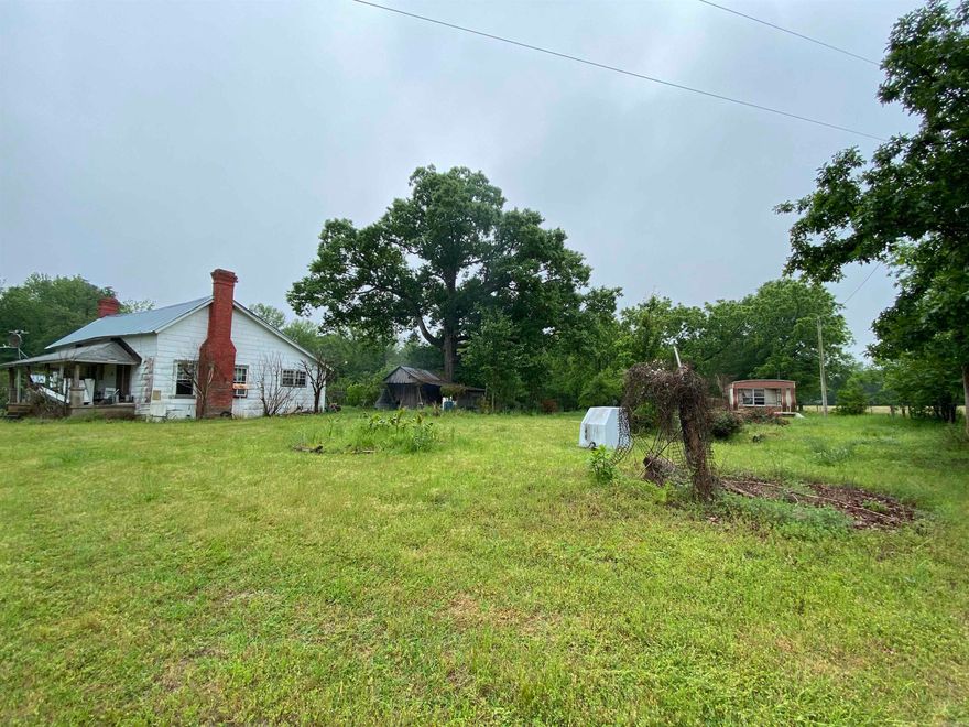 100 acres, located off Hempstead 349.  Property has an older frame farmhouse, 2 bedrooms and 2 full baths, needing a little TLC and a metal shop building. Property has a nice hay meadow, fenced and cross fenced, creek and some timber. Contact our office for more details or to schedule a showing.