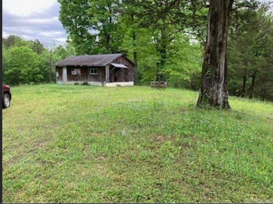 A lot of potential in this charming home on 5 beautiful rolling acres in the popular Lake Hamilton School District. The cabin has had new insulation added in the walls, new water heater, new well pump, new drain piping ran under the house, and more. Finish what was started and/or build your DREAM HOME! With about 2.5 acres wooded, there is plenty of wildlife to watch while drinking coffee in the morning. Don't miss out on this opportunity! SCHEDULE YOUR VIEWING TODAY!