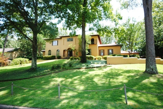 European style, custom built home. This home features high ceilings (10ft.), custom millwork, imported tiles, granite and hardwood floors. Commercially equipped kitchen, adjoining the den/family room. Downstairs guest suite consisting of a private sitting room and full bath.  Upstairs has the Master Suite and two additional bedrooms and baths. The grounds feature a pool and entertaining area. Two car attached carport and a detached 3 car garage.  THIS HOUSE IS BEING SOLD AS IS WITH NO REPAIRS.