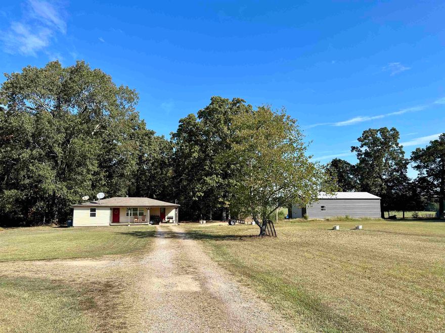 This 2 bedroom 1 bath home sits on 4 acres with a pond and new 20 x 40 shop. Nicely updated interior with the neutral gray and white tones, laminate flooring, new light fixtures and cabinet hardware. Cozy front porch that overlooks the large front yard. The back side of the acreage is wooded with a pond on the north portion of the 4 acre tract. Great starter home or retirement home for a small family!