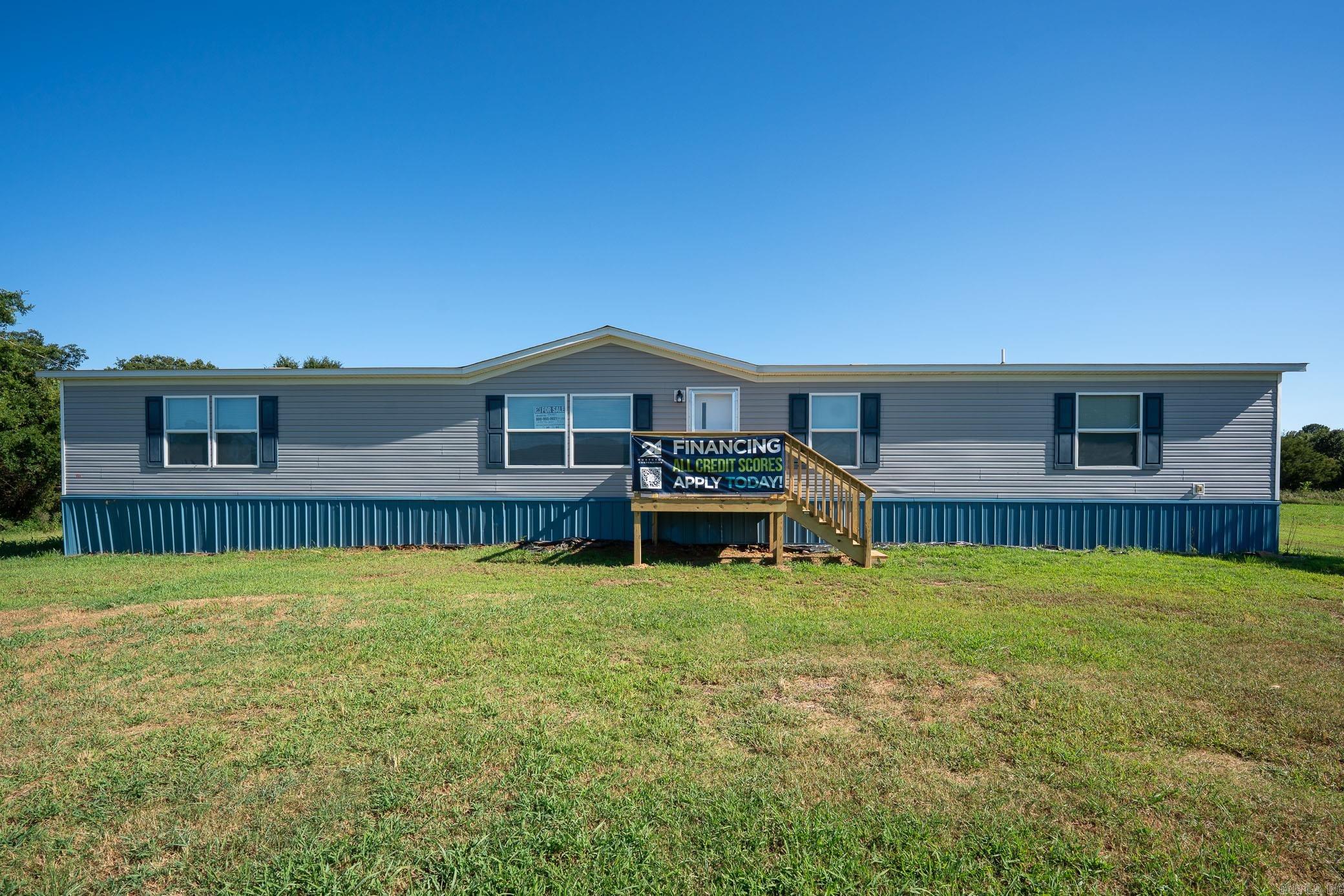 Explore this incredible opportunity to own a spacious 5-bedroom, 3-bathroom home set on a generous 6 acres! This 2020 Clayton home combines affordability with the tranquility of country living, providing the perfect backdrop for creating cherished memories with family and friends. Nestled on 6 acres, this property offers ample room for outdoor activities and a serene escape from the hustle and bustle. Enjoy peace of mind knowing that this modern home is only 5 years old, equipped with working components that ensure comfort and convenience. Financing is available through the seller, and your real estate agent can also assist you in securing competitive financing options for manufactured homes like this one. Donāt miss out on this unique chance to secure your slice of paradise! Get pre-approved and schedule your showing todayāthis gem wonāt last long! School District shows Ozark/Altus, please verify! Buyer's due diligence to verify.