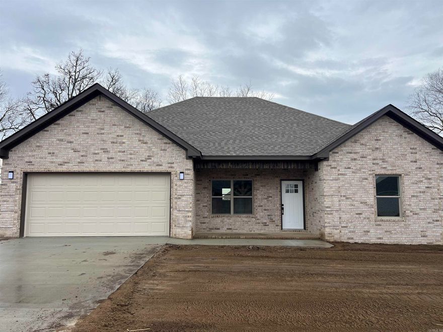 This beautiful 4 bedroom, 2 bathroom house is finished and move- in ready! You'll love the open floor plan with custom cabinets and granite countertops. Don't miss out on the opportunity to own this perfect new construction home!