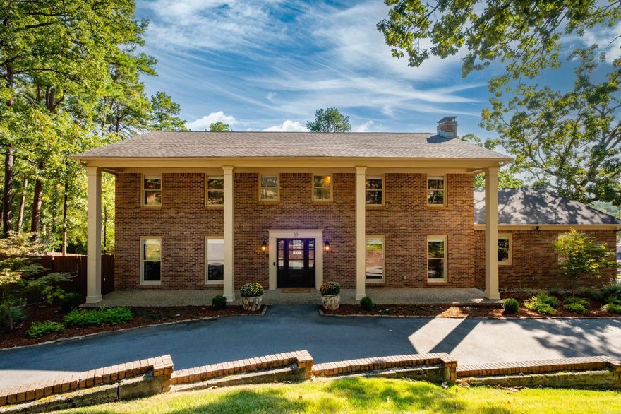 Wonderful traditional house in Pleasant Valley with lots of updates on a corner lot. Hardwood floors throughout the main level. Cozy den has a wood burning fireplace. Formal living and dining. The kitchen has been updated with new quartz countertops, marble backsplash and stainless appliances. One of two primary bedrooms is on the main level and is very spacious with walk in closets. An 800 square foot den/playroom is located on the lower level perfect for a man cave or theatre room and leads out to the backyard and patio. The second floor has four large bedrooms and three full baths which includes the second primary suite. The backyard is park like and a dram for kids. There is a covered deck and patio with a hot tub. The backyard is flat and has a basketball and pickle ball court, custom tree house with electricity, in ground trampoline and provides ample privacy. Circle drive, side load oversized garage and on a cul de sac. Tankless water heater.