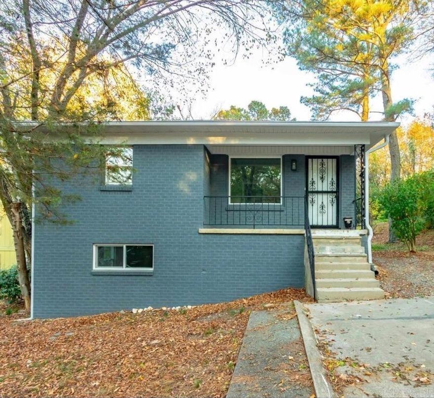 Tucked at the end of a quiet street next to green space, this beautifully updated two-story home blends modern design with classic Mid-Century charm.  Upstairs features two inviting living areas, a formal dining space, and a sleek kitchen with stone countertops and stainless appliances—including refrigerator, flat-surface range, Thermador dishwasher, and stainless vent hood. You’ll also find a full tiled bath, a spacious bedroom, and laundry area on this level.  Downstairs offers two additional bedrooms, another modern tiled bath with walk-in shower, and a workshop area with easy access to HVAC and storage.  Enjoy the privacy of your setting plus a long driveway for off-street parking—all in one of Hillcrest’s most desirable neighborhoods!  Year or 6 month rental options.