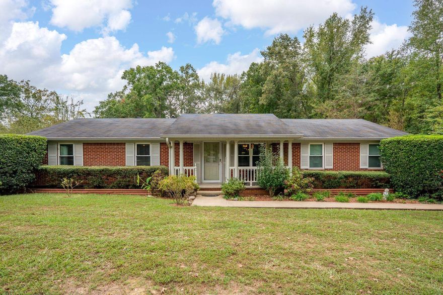 Traditional Family Home situated on over one and half acres. This home features 3 bedrooms and 2 baths.  You will enjoy the covered patio large enough for dining or outdoor living.  This property also has 2 storage buildings.  A huge bonus is the HOME GENERATOR !!! Agents See Agent Remarks