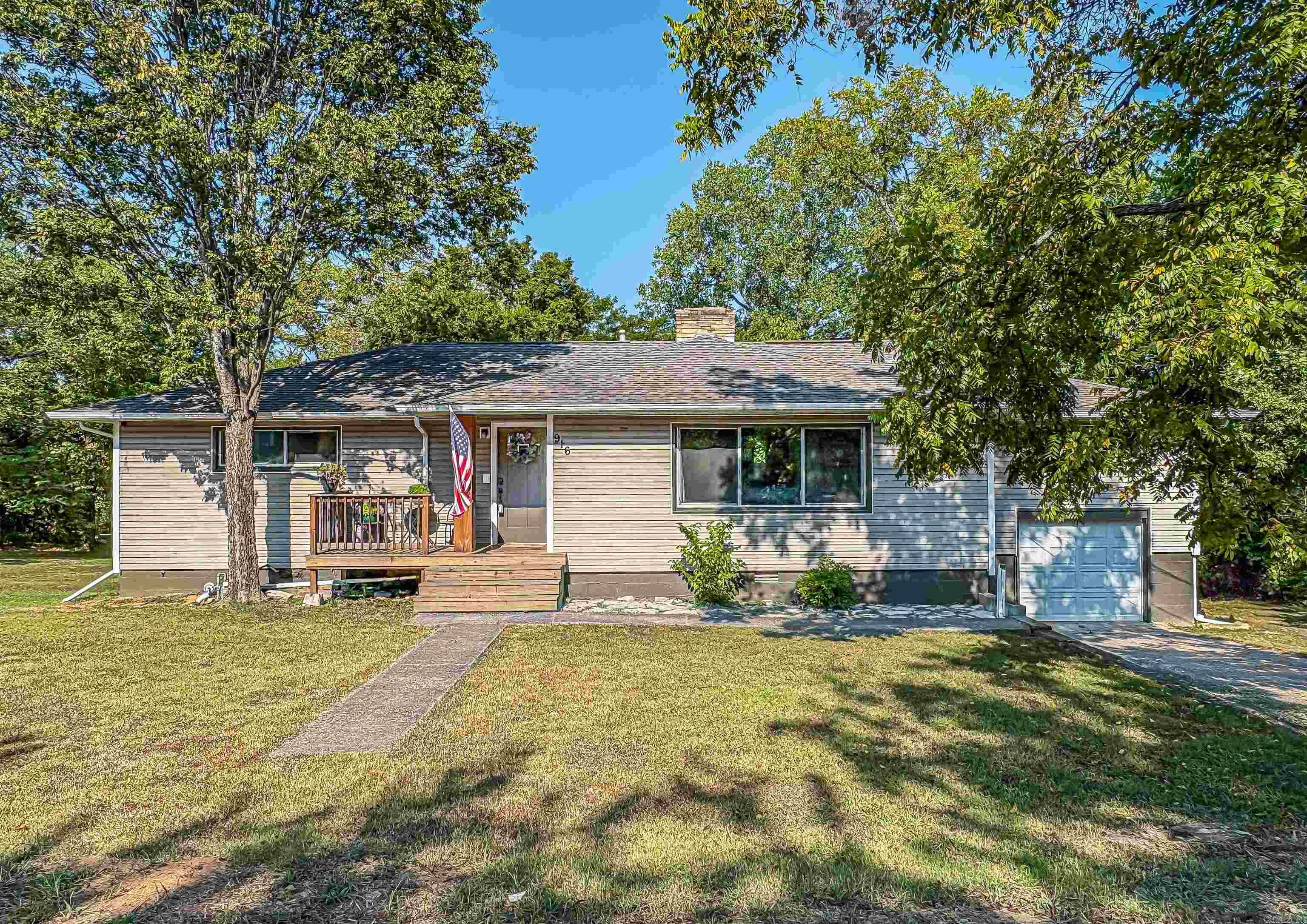 Adorable 3-bedroom home located in town for convenience to school, church, grocery store and other needs you may have. Updates include new windows, HVAC, Water Heater, Bathroom fixtures, light fixtures, deck, and a beautiful spacious kitchen. Enjoy the gas fireplace on those cold winter days or host family and friends in the spacious back yard. Partial basement has been updated to utilize space for utilities, laundry, storage, bonus room and a ½ bath.