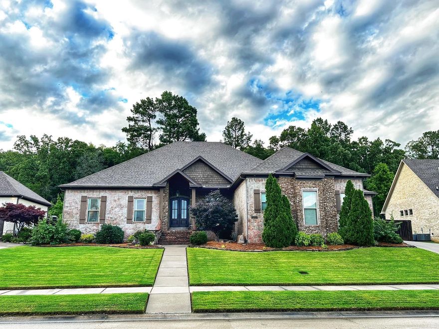 Tucked away on a quiet cul-de-sac in Weatherstone subdivision, this stunning 4-bedroom, 3.5-bath home blends luxury, comfort, and functionality. Step inside to find hardwood floors, vaulted ceilings, plantation shutters, and an inviting enclosed gas fireplace. The spacious office and four walk-in closets—with built-in shelving and drawers—make everyday living organized and easy. The chef’s kitchen features Bosch appliances, a gas range, double ovens, ice maker, walk-in pantry, and abundant built-in storage. The extra-large master suite is a true retreat, offering a spa-like bath with a double walk-in shower. Enjoy seamless indoor-outdoor living with a large covered patio showcasing vaulted tongue & groove ceilings, an outdoor wood-burning fireplace, and beautifully designed landscaping complete with waterfall, flagstone, and river rock paths. Situated on a ridge lot with green space behind, this home offers privacy, a sprinkler system, French drains, exterior lighting, a 3-car garage, and truly great neighbors. A rare find!