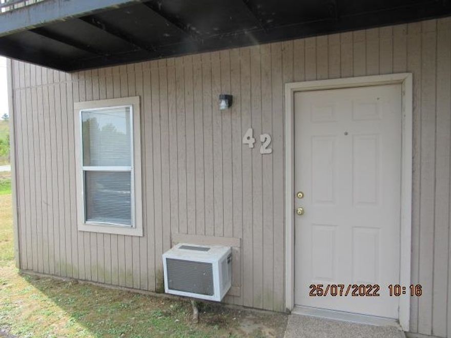 1 bedroom 1 bath ground level unit, new carpet & vinyl throughout, freshly painted interior walls, new stove, large bedroom, window unit that is both heat & cool, coin operated laundry facility on site. No Pets.