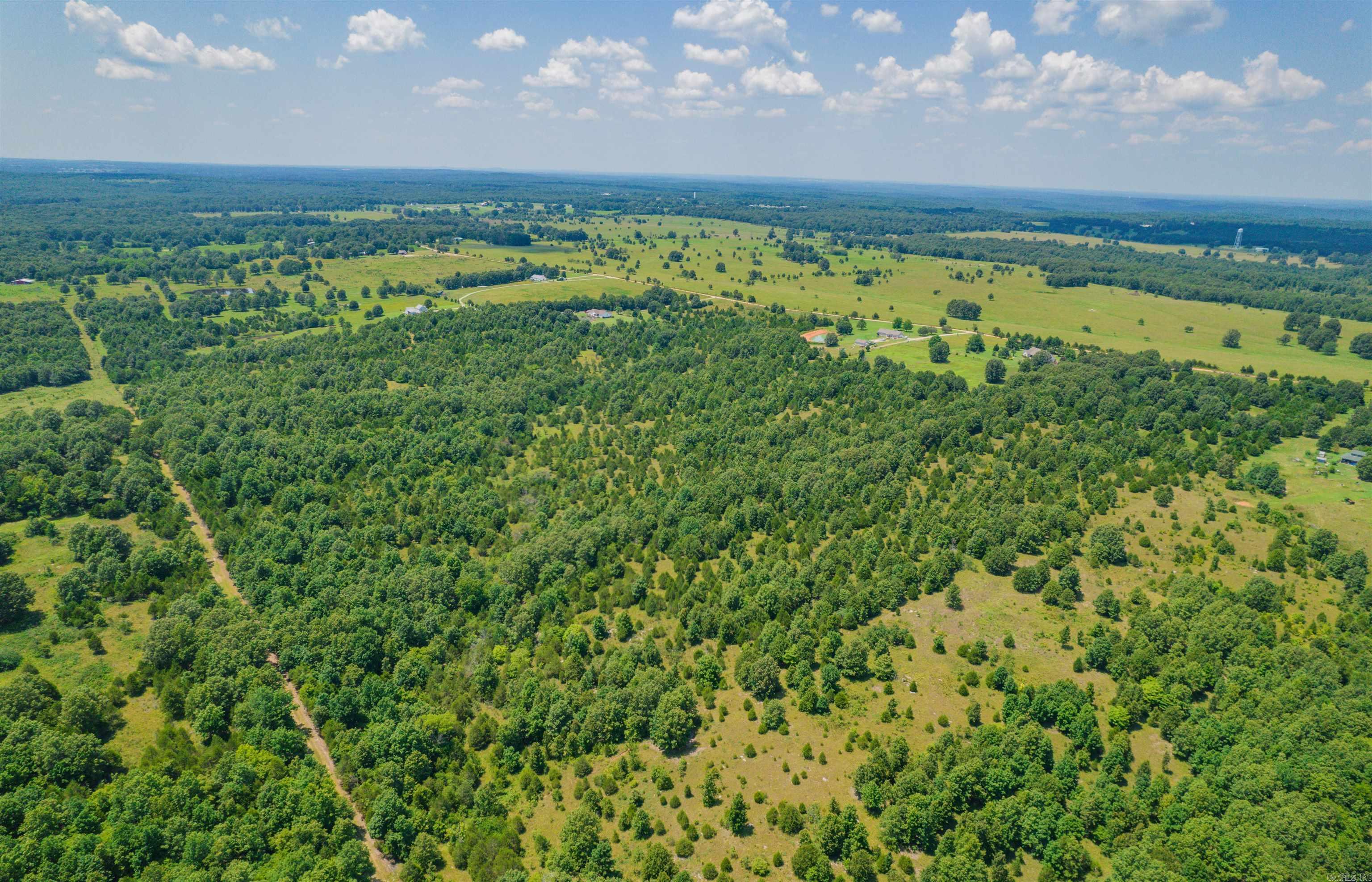 This 35 acre property in Sharp County, Arkansas is located just minutes from the Spring River! And the Harold E Alexander Spring River Wildlife Management Area of the Arkansas Game and Fish Commission! Perfect place to build a cabin for those weekend get aways to float the river or build a farm house and watch the cattle and horses graze. No restrictions! Just a few minutes to Highland and Hardy, Arkansas! Electric is available but not on property.