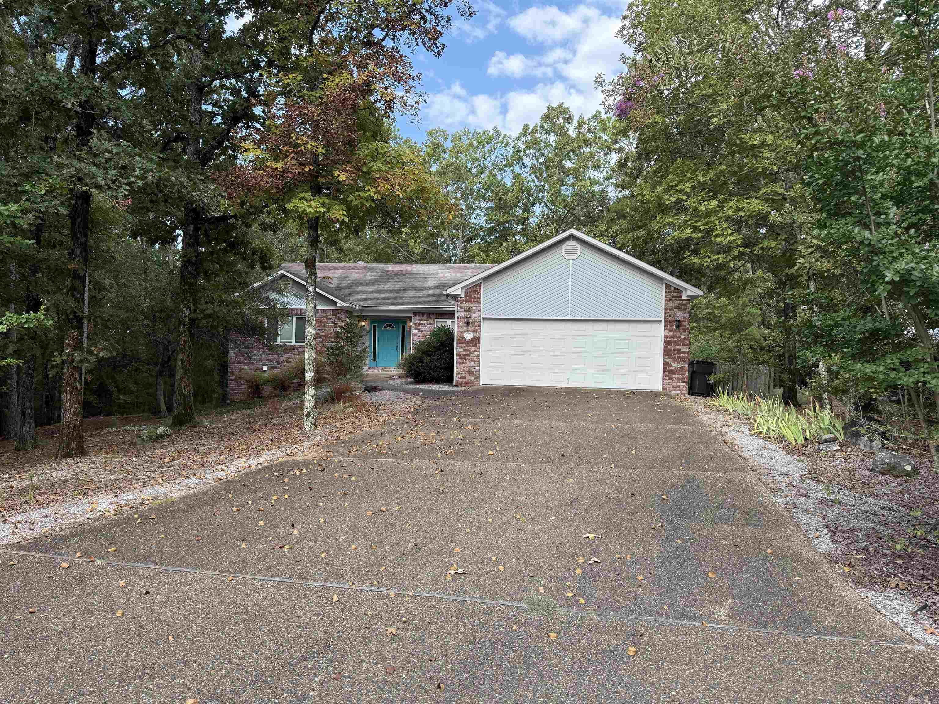Welcome to 11 Campeon Court, a charming and serene residence nestled in the peaceful community of Hot Springs Village, Arkansas. This home would be a great purchase for someone that doesn't mind giving the home a makeover which it deserves. Located on a quiet cul-de-sac, the property boasts a lush yard ideal for outdoor activities and relaxation. Whether you're seeking a cozy retreat or a family-friendly neighborhood, 11 Campeon Court provides an inviting atmosphere with convenient access to local amenities, recreational facilities, and the natural beauty of the surrounding Ouachita Mountains. Don't miss the opportunity to make this lovely house your new home!