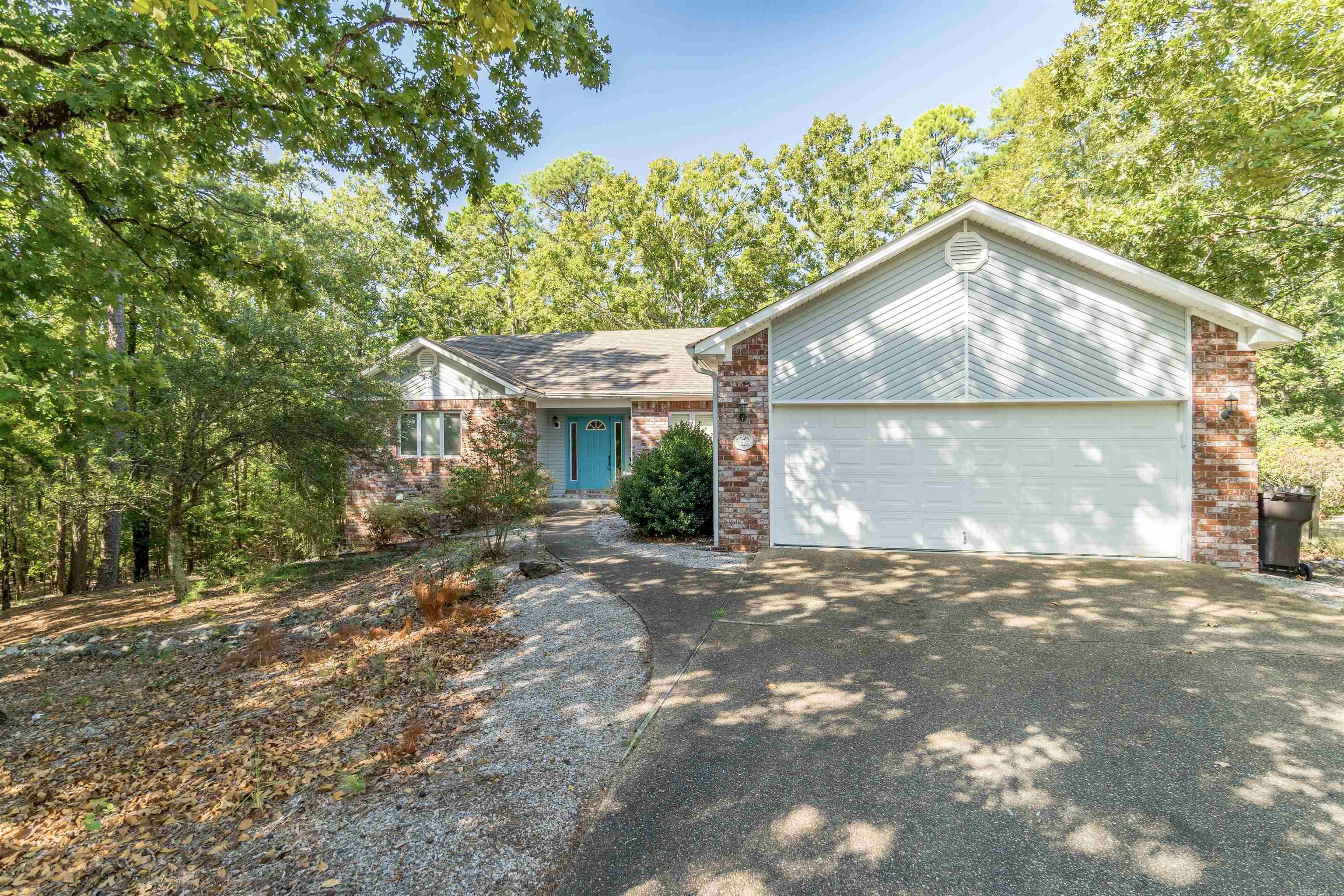 Welcome to 11 Campeon Court, a charming and serene residence nestled in the peaceful community of Hot Springs Village, Arkansas. This home would be a great purchase for someone that doesn't mind giving the home a makeover which it deserves. Located on a quiet cul-de-sac, the property boasts a lush yard ideal for outdoor activities and relaxation. Whether you're seeking a cozy retreat or a family-friendly neighborhood, 11 Campeon Court provides an inviting atmosphere with convenient access to local amenities, recreational facilities, and the natural beauty of the surrounding Ouachita Mountains. Don't miss the opportunity to make this lovely house your new home!