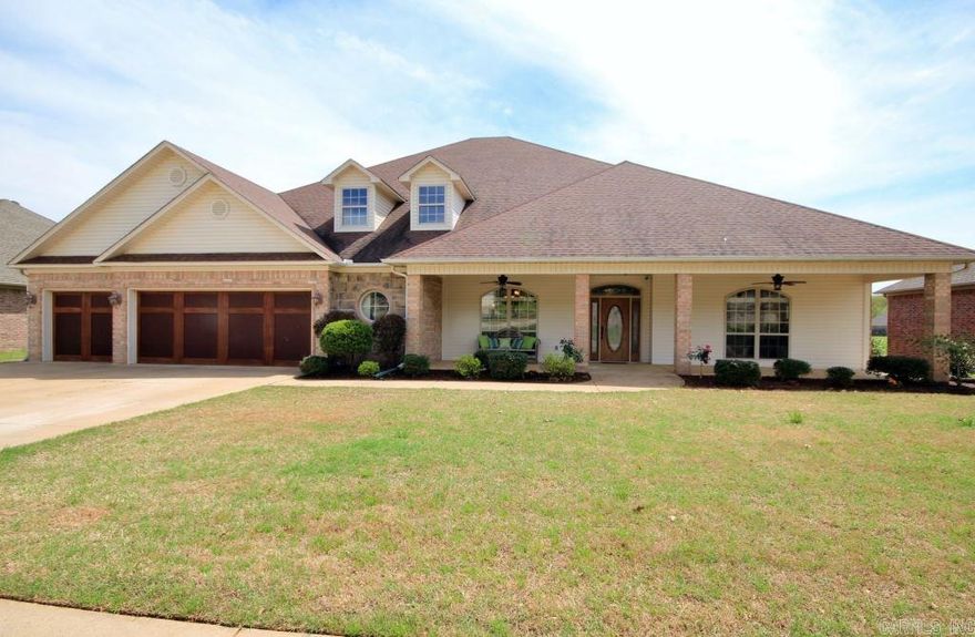 This home has the WOW factor!! Built in 2005, but everything practically new and move-in ready. Kitchen is perfect for the entertainer with 2 Bosch dishwashers, induction stove top, walk-in pantry, large granite island, touch faucet, and open to living room and hearth room, and also overlooks the lake! Beautiful hardwood floors through most of the home, marble and travertine floors in bathrooms and master closet. Enjoy the fenced backyard with access to the lake.