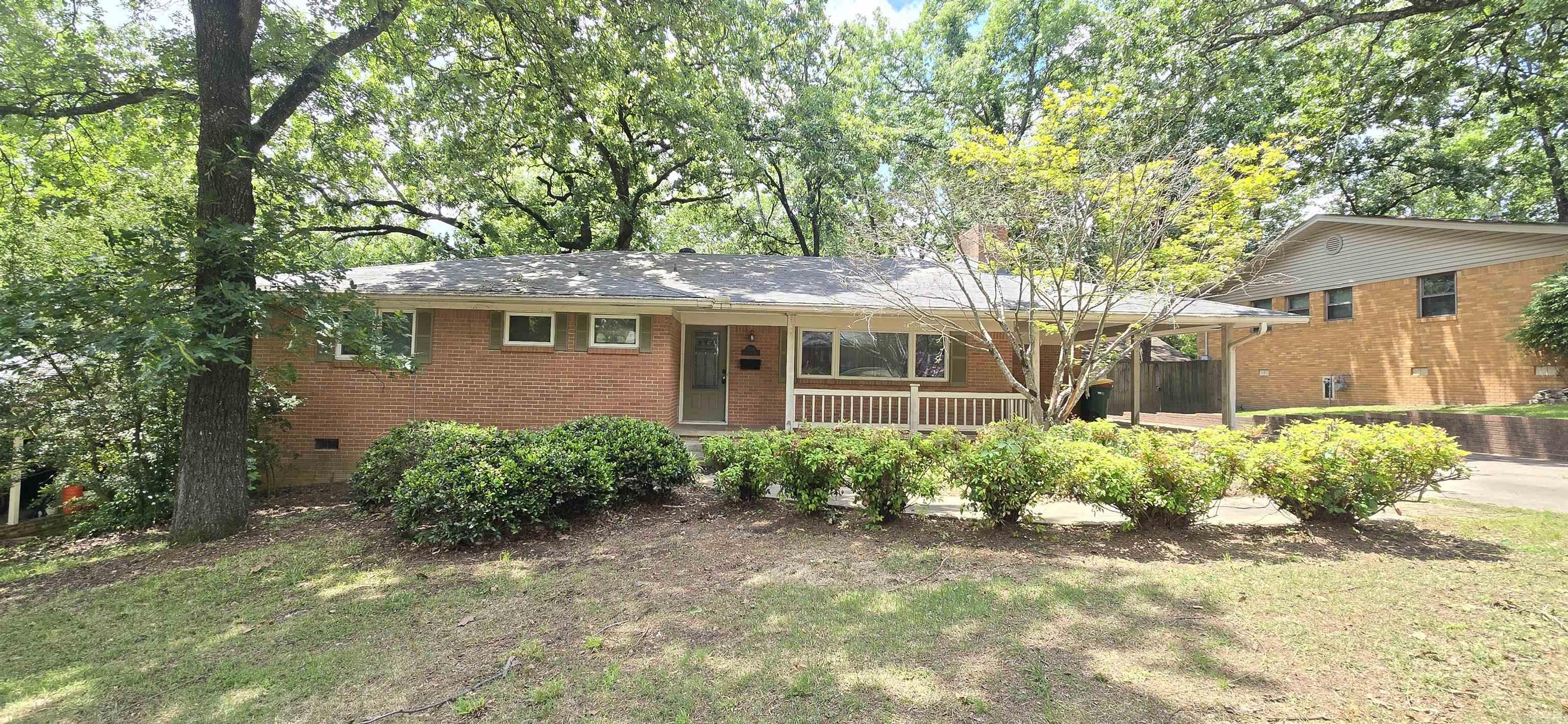 3 Bedroom 2 Bath Non-Smoking house in the Lakewood area of North Little Rock. The kitchen is furnished with all of the appliances including a stove, fridge, dishwasher, disposal and microwave. This home includes an open floor plan, has hardwood floors, NEW carpet, and vinyl flooring, a huge kitchen island/bar, fireplace, dining area, storage, ceiling fans, central heat and air, washer and electric dryer connections located in a separate utility room (dryer there for your use - no maintenance), blinds, carport, fenced back yard, patio, and deck.