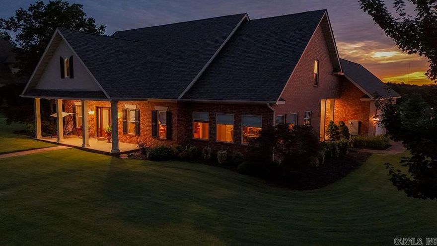 Located in the desirable Lake Crest Subdivision (Layman Crest area of Jonesboro, AR), this impressive 3,816 sq. ft. (more or less) home offers a spacious and functional Southern Living floor plan ideal for comfort and entertaining. The main level features a master ensuite, a large eat-in kitchen with abundant natural light, a den with gas log fireplace and built-in shelving, a formal dining room, a large home office, a laundry room with sink, a half bath, and a bright sunroom. A side entrance provides convenient guest access.  The three-car garage includes a heated/cooled locked storage room—perfect for securing firearms, outdoor gear, or other valuables. Flooring throughout the home includes hand-scraped hardwood, acid-stained concrete, carpet, and tile. Upstairs you’ll find one bedroom with a private bath, two additional bedrooms with a shared full bath, and exceptional attic storage with plenty of space for large items. A versatile upstairs bonus room, located off the side entrance, works perfectly as a playroom, media room, or craft space.  This Jonesboro, Arkansas home for sale is in immaculate condition and truly move-in ready. Conveniently located near schools, shopping, din