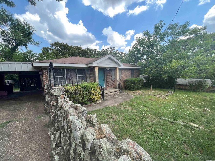 Here we have a nicely remodeled 3 bedroom 1 bath home on a quiet street in North Little rock. The home has a private driveway with a covered carport, Iron fence front yard and gated back yard. The home has original hardwood floors and carpet in one bedroom. The kitchen has nice wood stained cabinets and subway tile for the backsplash. Stainless steel appliances included! the bathroom has been updated with a tile tub shower and tile floors! Come take a look before this one is sold!