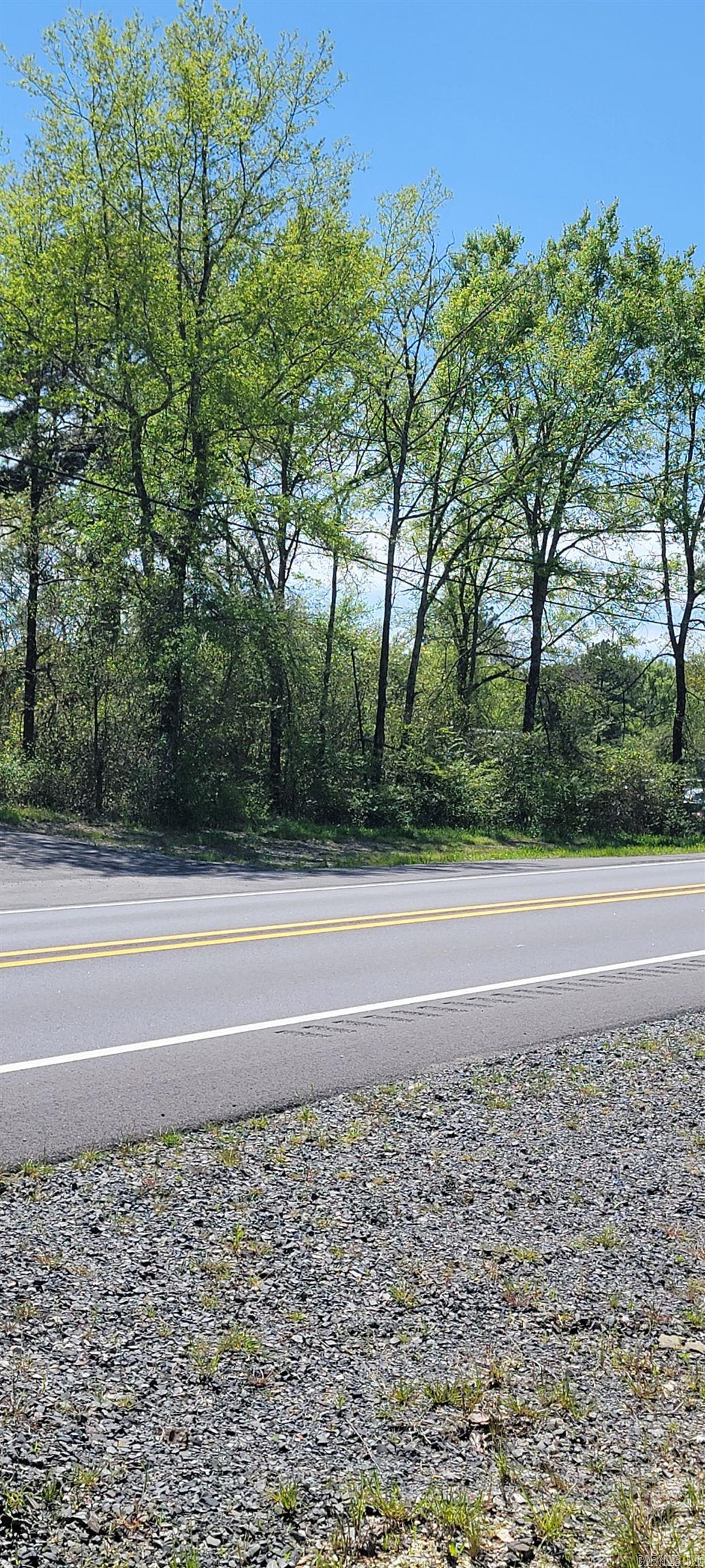 Building lot in Lake Hamilton SD with approx 100 ft of hwy frontage.