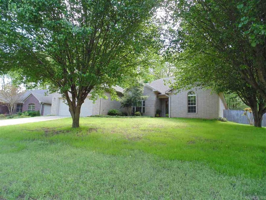 Wonderful layout with great appeal.  Beautiful hardwood and large master suite.  Lovely sun room opens to master suite as well as living room.   Huge kitchen with island and lots of cabinetry.  Formal dining and breakfast room.  It's very spacious,  a must see!!    Large back yard with 12X20 utility building in chainlink fenced back yard.  Flowering plants throughout the back yard and neatly manicured flower beds.