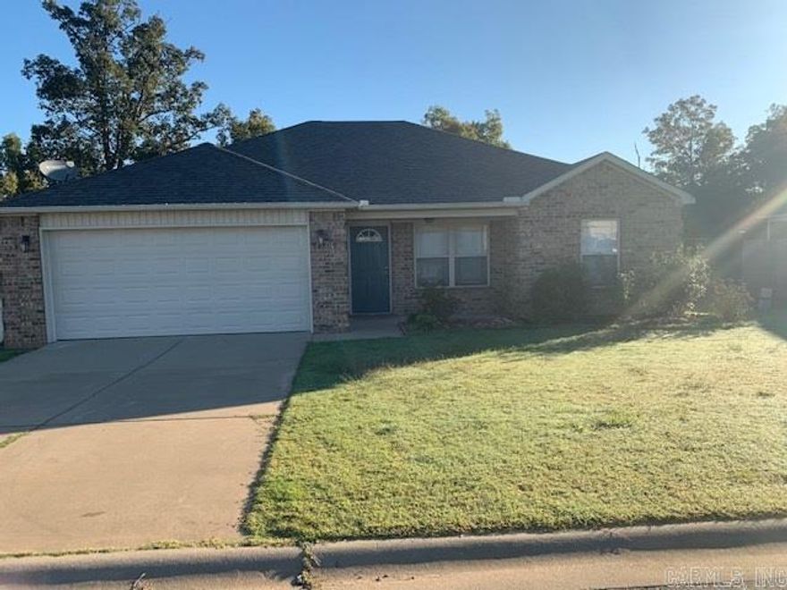 What a great home in Bryant School District!! 3 bedroom 2 bath w/ 2-car garage! Perfect split floorplan! Hardwood , tile flooring and carpet in bedrooms! Tile back-splash in kitchen! Beautiful cherry cabinets, kitchen is fully furnished Open floorplan that everyone wants! Separate laundry room with new washer & dryer! Beautiful tray ceiling in master! Double vanities in master bath & lg walk-in closet too! Tenant is responsible for water, electric and gas. Sorry this is a non smoking property