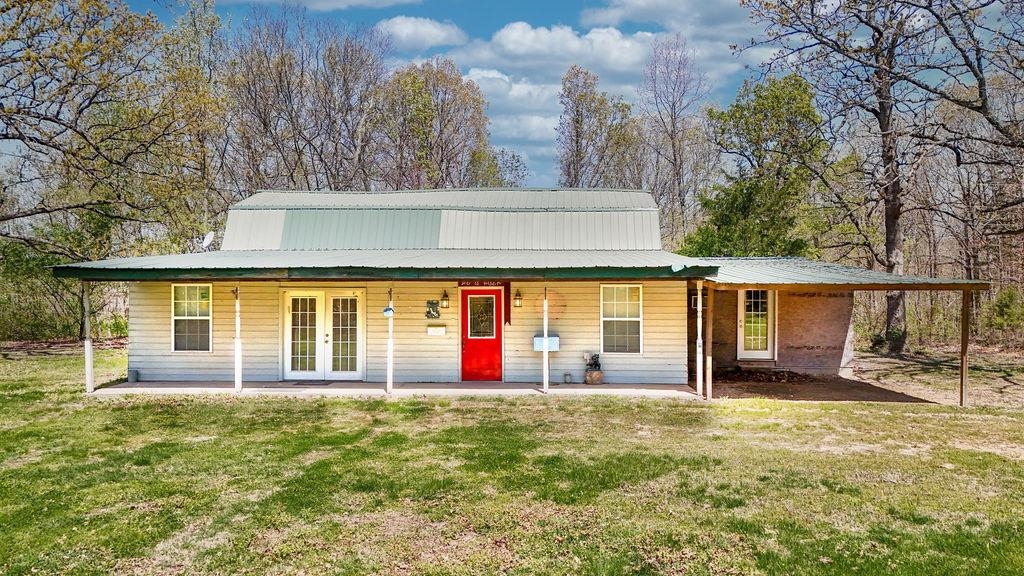 Imagine stepping into a landscape where nature's beauty embraces every corner, offering a perfect backdrop for your creative dreams. Nestled on approximately 5.75 acres, this property presents a unique opportunity for those seeking a canvas to craft their vision. A serene and picturesque setting, combining the tranquility of wooded areas with the openness of cleared land. The home is partially constructed with a significant amount of love and effort already invested. However, it awaits your personal touch to reach its full potential.