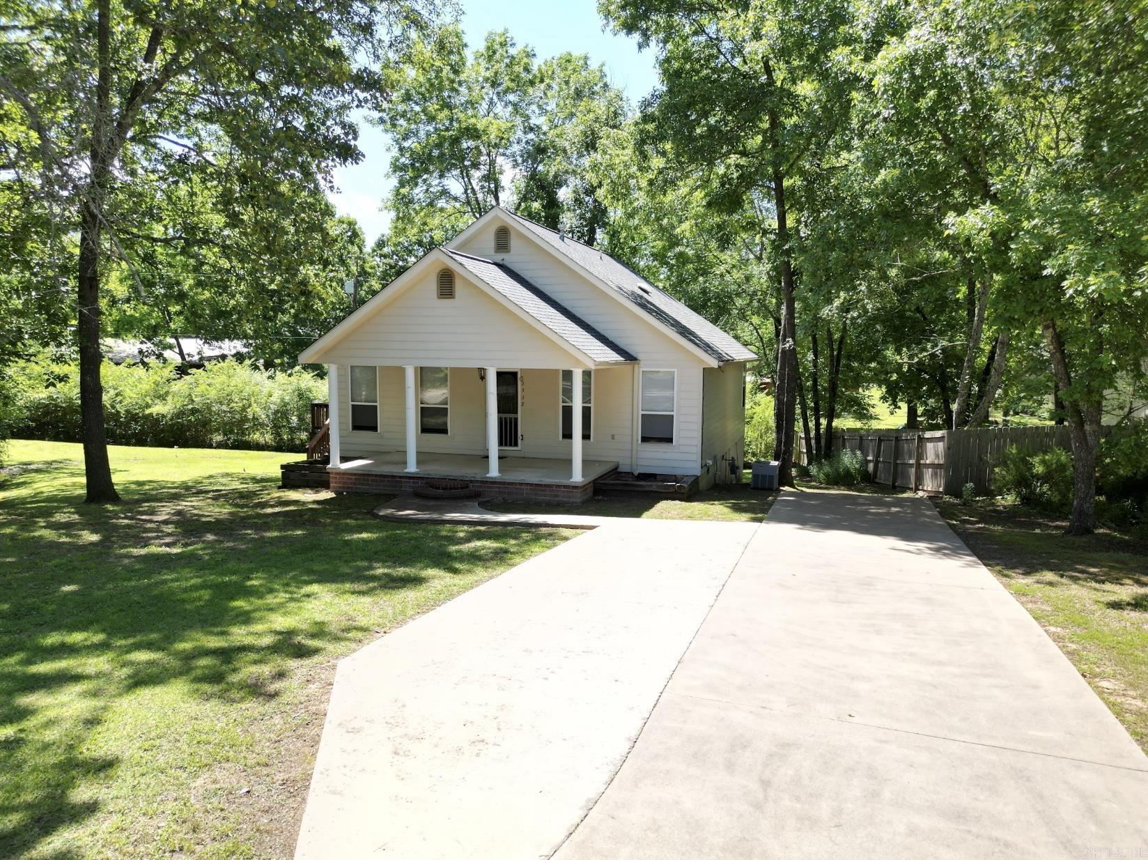 well maintained home in a very good location, near Greers Ferry lake and Thunderbird Golf Course, large covered front porch, tree shaded wrap around deck to relax and grill on, vaulted ceiling living room, open kitchen with pantry, oversize master bedroom with walkin closet, home also has 9 x 31 partially finished basement that could be an office or man cave, new roof May 2025
