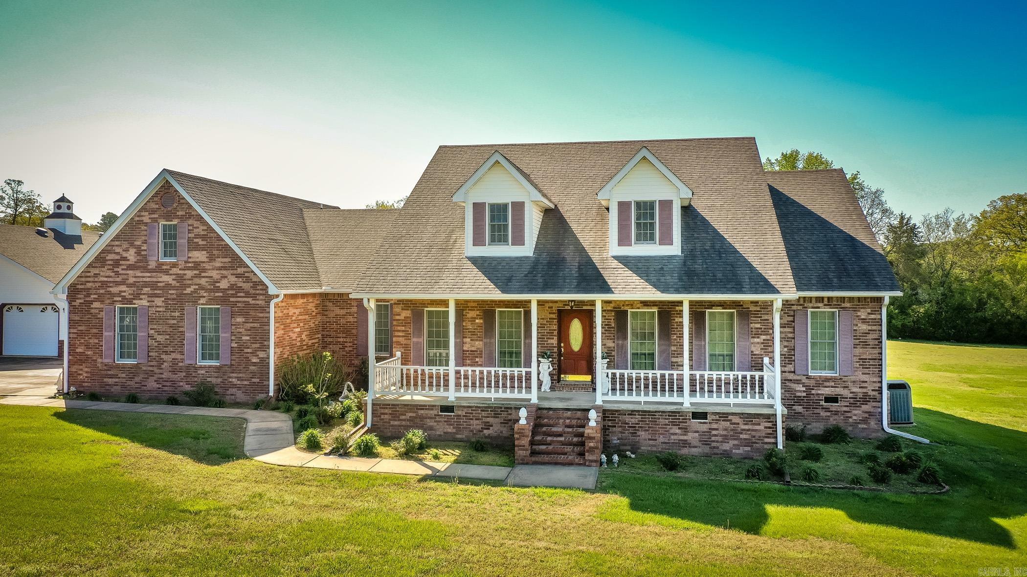 Welcome to this spacious and well-maintained two-bedroom brick home situated on 6 beautiful acres of pasture land. Originally designed as a three-bedroom, this home offers the potential to easily add a third bedroom. Built with quality in mind, it features 2x6 exterior walls, a clean crawl space with vapor barrier, and a regularly serviced HVAC system. Enjoy serene country views from the large covered porchesāideal for relaxing, entertaining, or summer barbecues. The impressive 44x50 shop includes a 700 sq ft finished man cave or apartment with a kitchenette and a bathroom. The shop also accommodates large RV storage with a 50-amp and sewer hookup. This property is the perfect combination of comfort, functionality, and rural charm. Located just 15 miles from Lacey's Narrows Marina & state campground on Greers Ferry Lake and less than 18 miles from Greenbrier. See agent remarks