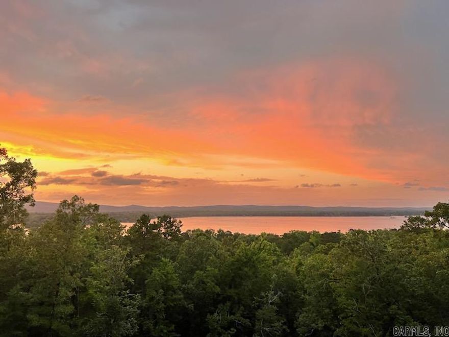 Want to own the home with the best view of Harris Brake Lake? This home is newly constructed and has a PRIME view of Harris Brake Lake and beyond! It sits on 11+ acres and adjoins 40 acres of Arkansas Game and Fish Commission WMA! Hunt, fish and enjoy sitting on the beautiful back porch, while soaking up your view for miles and miles! This home features 5 bedrooms and 3 full bathrooms! Host Christmas and invite your entire family! There is LVP flooring throughout the entire home! Warm up this winter to the gas fireplace. Custom cabinets are featured in the kitchen! The primary bedroom has access into the laundry room! There is a separate garage/shop on the property and beautiful gated entrance! The basement is fully encapsulated and has a dehumidifier! First floor square footage is 2,154 sq/ft. The fully finished basement square footage is 672 sq/ft.
