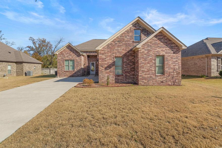 Built in 2023, this all-brick home in Hurricane Lake Estates blends a fresh feel with a comfortable, open layout. The kitchen, dining and living areas flow together, making it easy to cook, gather and entertain. The kitchen features granite countertops, an island with a sink and a pantry that offers plenty of space. The living area has built-ins and an accent wall that adds a nice touch. The primary bedroom is set apart from the others and includes an en-suite with a soaker tub, separate shower and two walk-in closets. On the opposite side of the home are two additional bedrooms and a full bathroom. Upstairs, you’ll find a landing area at the top of the stairs that works well as an office space, a large bonus room, a full bathroom and a fourth bedroom, along with plenty of floored attic storage. Outside, you’ll enjoy an oversized two-car garage, a private backyard with a partial lake view and a covered patio for relaxing or entertaining. “Arvest employees, directors and their family members are ineligible to purchase Arvest’s bank-owned properties.”