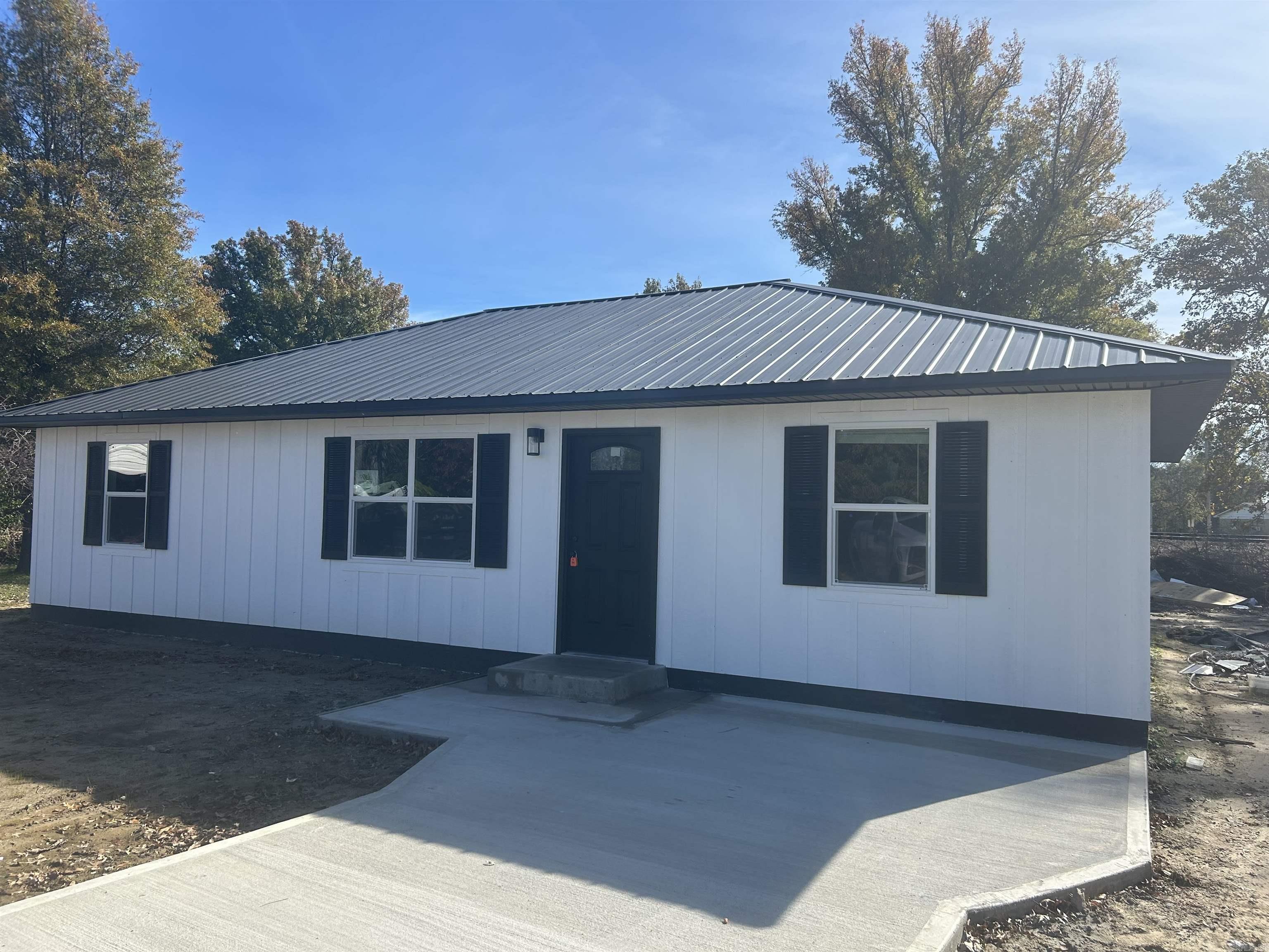 Check out this charming single family home that has 1,247 sq ft of living space! This new build home sits on a very spacious lot and is conveniently located close to Hoxie school. There are several amenities including granite countertops, luxury vinyl plank throughout the house, spray foam insulation, and a covered back patio attached to the house. Donāt miss out on a chance to make this your forever home. Call and schedule an appointment today!