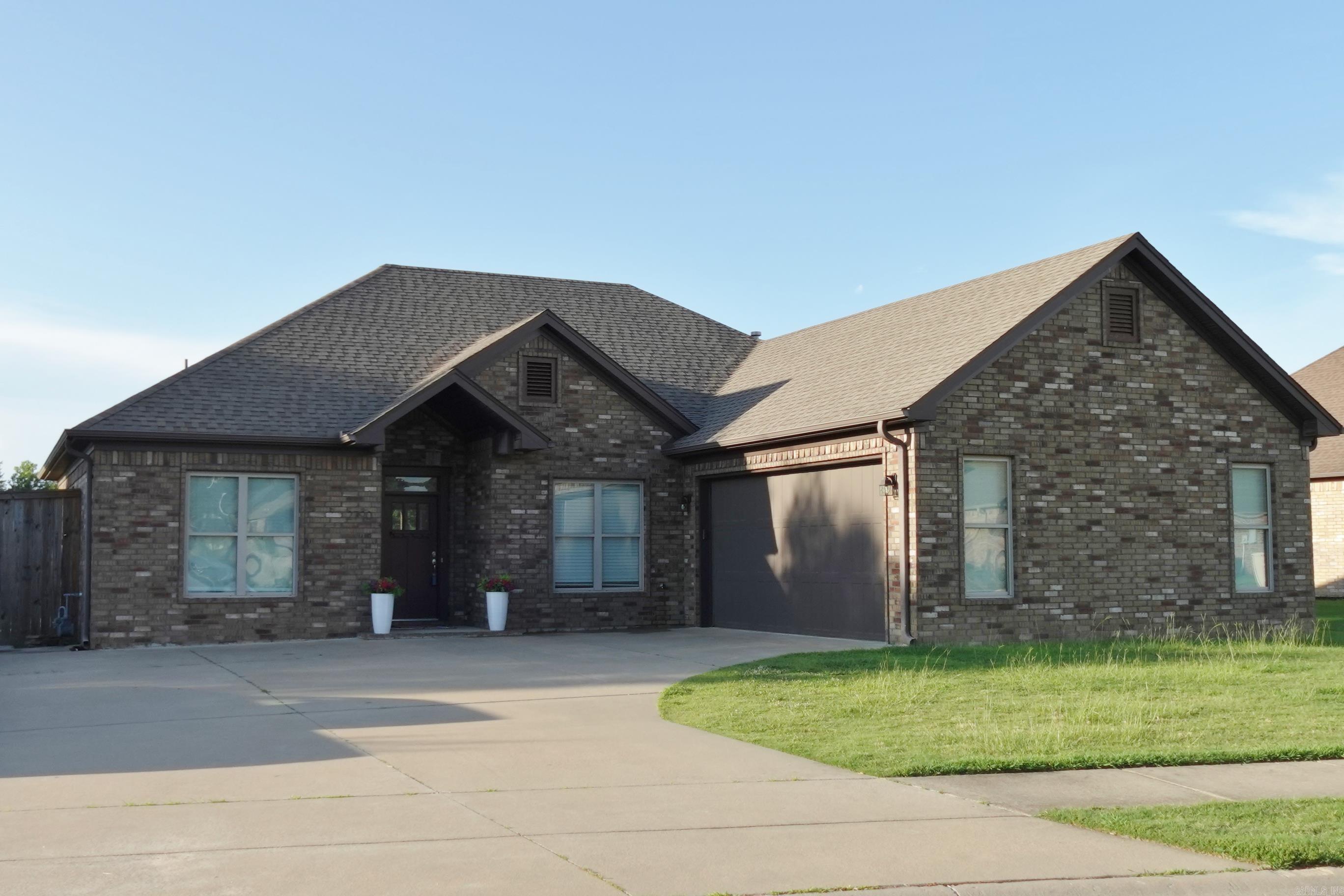 Custom built 3B/2BA home with office/playroom at the entrance of Salem Woods Sub'd yet in Salem Landing Addn so no HOA dues or covenants and restrictions. Next to large green space. Split BR plan. Open floorplan. Can lights throughout living areas. Primary BR oversized with trey ceiling and BA has large custom tile shower with double shower heads, Jacuzzi tub, double sinks, granite countertops and large walk-in closet. Laundry room has folding area and lots of storage. Kitchen is open to LR and eating area with granite countertops, custom cabinets, subway tile backsplash and gas range. Dishwasher replaced in 2025. LR has trey ceiling with gas fireplace. Only carpet in home is in the BR's and rest is tile or luxury vinyl. Oversized insulated side entry garage with workbench and still room to park 2 cars. Upgraded garage door is a 3 panel insulated door w/ programmable door openers. Backyard has nice patio with 8' fence. Double gates will be installed before closing. Oversized driveway with extra parking that will accommodate 6+ cars in addition to garage. See agent remarks