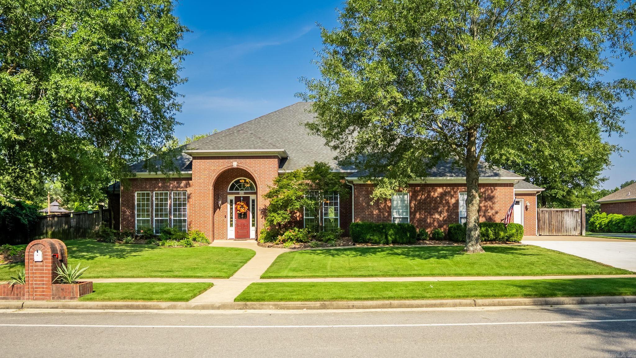 This home offers a "Lifestyle" that many desire. Gorgeous 5 BR, 5 bath home in the perfect location to enjoy not only the in-ground pool from the covered patio but also a view of Little Maumelle River. Thoughtfully designed for beauty, comfort & enjoying the outdoors from almost every room. Ceilings on the main level are 12 ft. with awesome crown molding. Formal areas & a huge kitchen w/breakfast bar, pantry, double ovens & 5 burner gas stove. Primary suite has his and her full separate baths and closets. One of which serves as a storm room. Two other bedrooms and 2 more full baths are also available on main level. One would make a great office with cedar-lined closet. The den with WBFP is a great place to relax and enjoy TV with surround sound, which is throughout the home. The gorgeous staircase leads to 2 additional bedrooms and a full bath. In addition there is a tremendous amount of walk-in attic storage. This home includes a 3 car garage, sprinkler & alarm systems and an attention getting brick and wrought iron gate leading to the water. Members have access to a boat ramp. Convenient location, but the feel of being out of the city. It's a rare find! Designed by owner