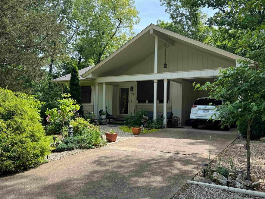 Country home located in Cherokee village Arkansas. 2 bedrooms 1 1/2 bath 1,032 sq ft of well laid out living space. Home is nestled in a Beautiful setting with no close neighbors, sprinkled with large shade trees and ornamental landscaping, which include peach, pear and plum trees with a few dogwood trees and evergreens and mature hardwoods. 10' X 16' Storage building that will convey with property, property consists of 2 lots totaling slightly over a half acre. The house has had new HVAC installed September of 2022, New windows and patio doors installed in October 2022, Air ducts cleaned in February 2023, New roof April 2023 along with other grounds improvements for additional parking spaces and turn around. 240 sq ft deck opens up from eat in kitchen dining and from the back bedroom.