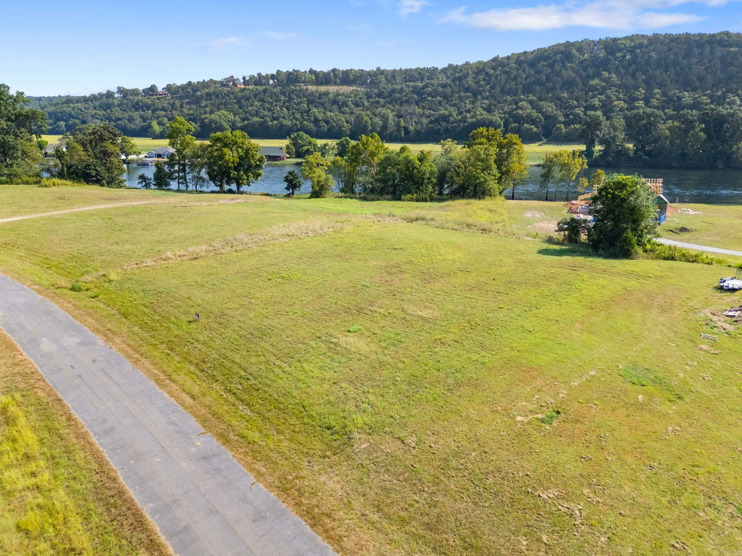 Discover the perfect opportunity to build your dream getaway in the scenic Denton Ferry Bottoms neighborhood. This beautiful lot offers a stunning view of the White River, known for its peaceful flow and incredible trout fishing. Just minutes from Cotter, Arkansas the āTrout Fishing Capital of the Worldā This location is a haven for anglers, outdoor lovers, and those seeking a tranquil escape. Lot has available underground electric, and natural gas. Nestled in a quiet area, the lot provides easy access to river adventures, charming small towns, and the natural beauty of the Ozarks. Whether youāre planning to build a vacation retreat, forever home, or investment property, this lot is full of potential. Wake up to river views, enjoy nearby fishing and floating, and unwind in the heart of one of Arkansasā best-kept secrets. Donāt miss this rare chance to own a piece of paradise near the White River!