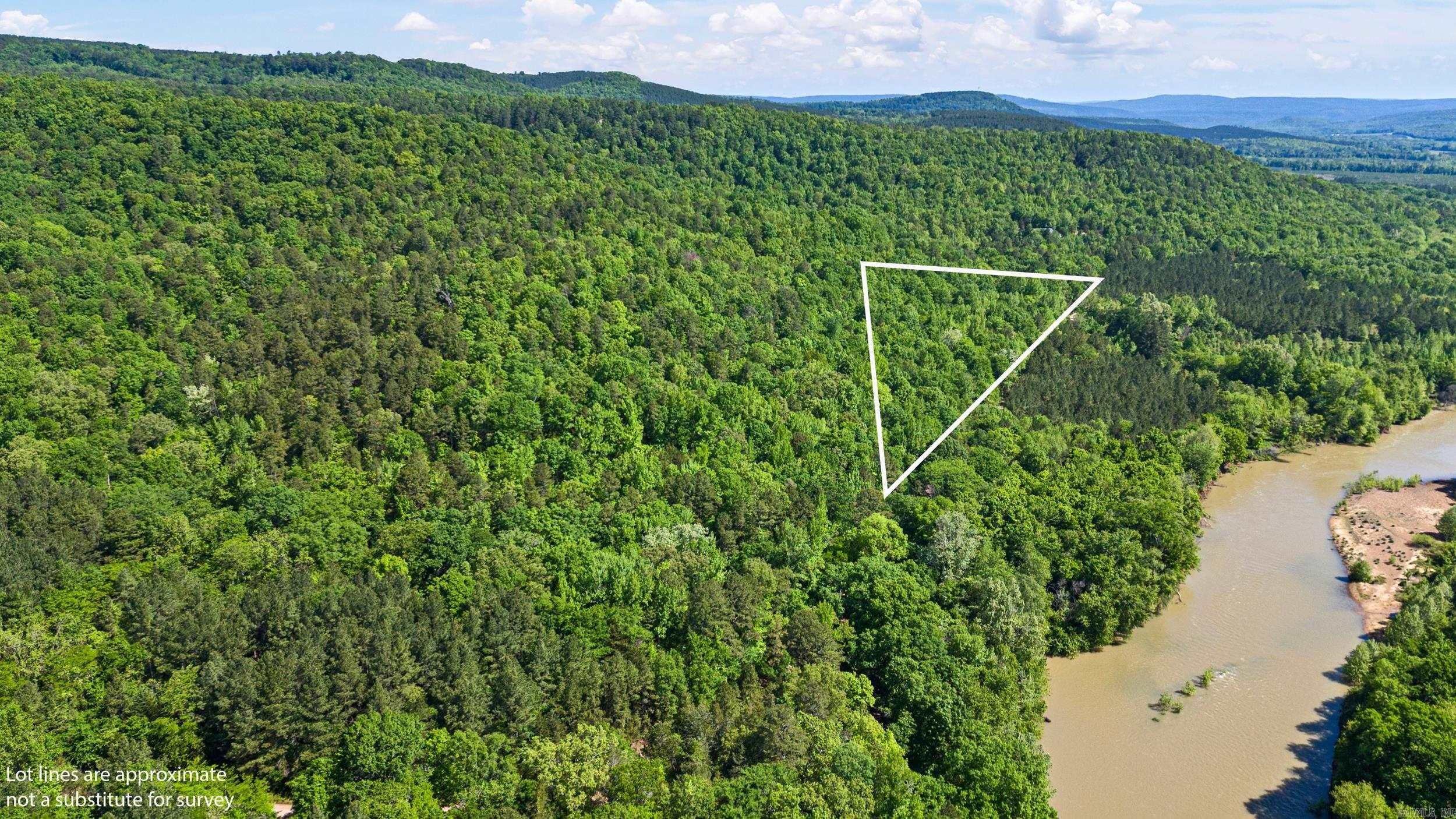 Close to BIG PINEY CREEK !! Have you wanted your own PRIVATE and SECLUDED place close to the creek? This 11.26 Acres has amazing potential. Pull in a camper, build your own cozy cabin or just enjoy all the NATURAL beauty. Enjoy sitting beside a wet weather creek and all the beautiful rocks.