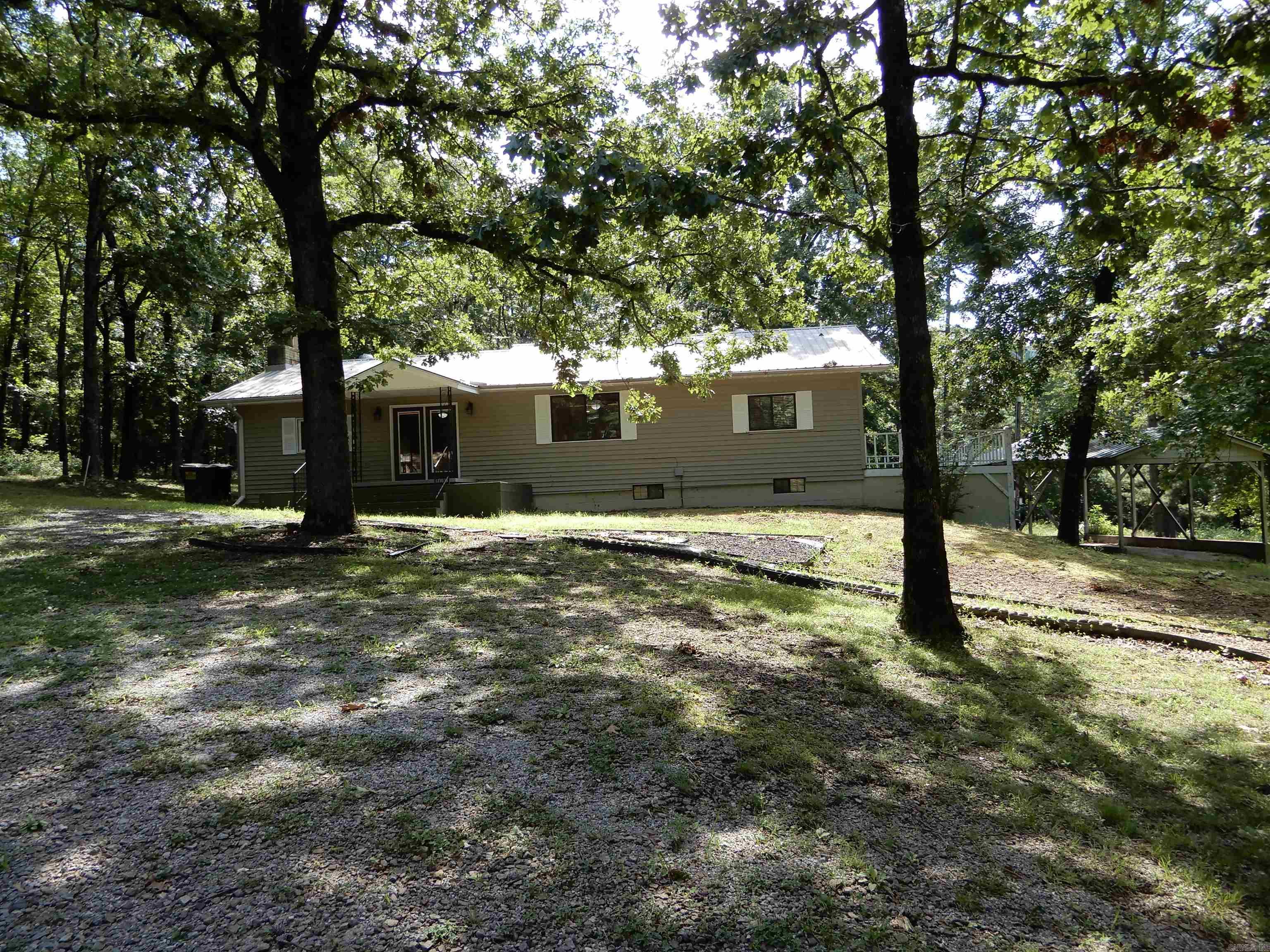 This secluded 2 bedroom home features 2 full bathrooms and a half bath with large basement for additional sleeping quarters all nestled in a private area on Sunny Slope Road. There is two covered areas for additional parking. The covered back porch provides a wonderful place to watch nature's wildlife and enjoy the feeling of country life in the city. This home also is very close to Restaurants, Family Market for groceries, Dollar General, Gasoline Stations, Post Office, Pharmacy, Baptist Health Family Clinic, Westside Schools and much more in Greers Ferry, Drasco and Heber Springs. Call today for a private showing. (Credit Check and Background Check will be required from Owner prior to Showing Property)