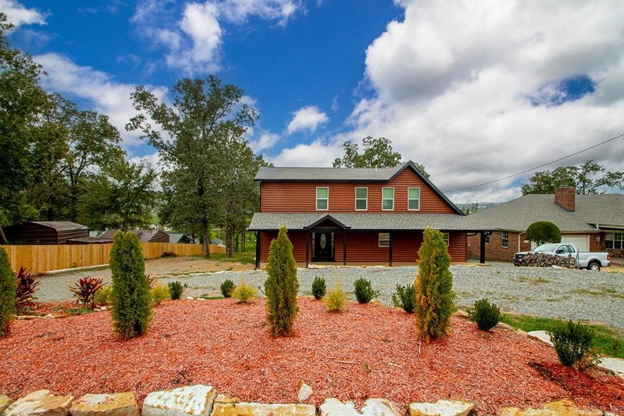 Fully remodeled log cabin retreat on revitalizing Lake Conway! This 4-bedroom, 3-bathroom home blends rustic charm with modern convenience. The cozy living room feels like “a step back in time,” while the enormous kitchen—complete with endless countertops, abundant cabinetry, and modern appliances—delivers every luxury for today’s lifestyle. Perfect for entertaining, the open flow invites gatherings of all sizes. The flex space downstairs offers versatility—ideal as a 4th bedroom, teen hangout, or private guest suite. Throughout the home, enjoy the comfort of a brand-new roof, HVAC, appliances, and windows. Outside, two wrap-around porches provide serene spots for relaxing, entertaining, or taking in the natural setting. Lake Conway is currently undergoing an exciting revitalization project set for completion by the end of 2026, making this a unique opportunity to own now before the lake’s renewal enhances both lifestyle and value. Whether you’re seeking a primary residence, weekend retreat, or investment, this one checks all the boxes.