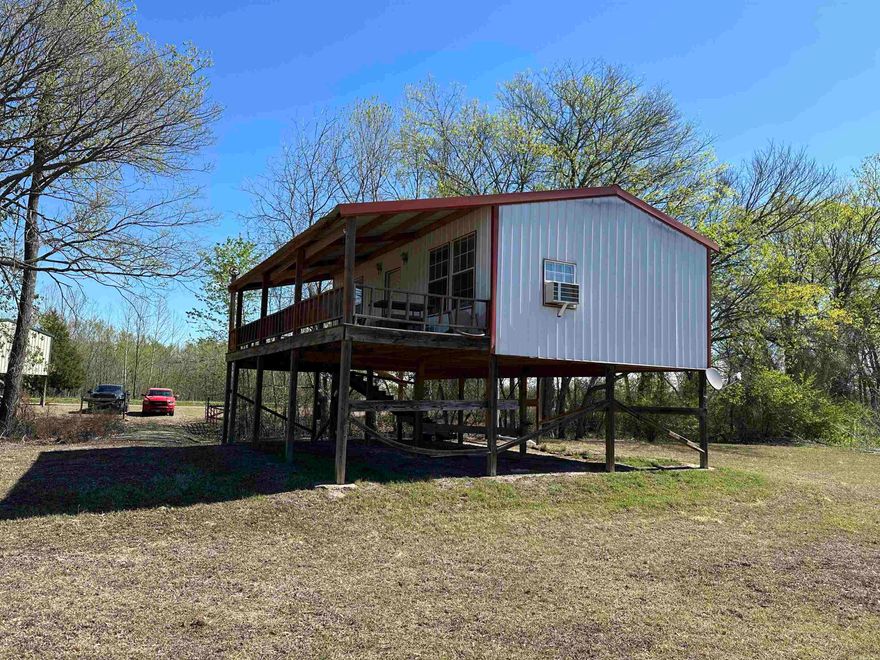 The affordable duck camp you’ve been looking for! Located on the banks of the White River off of Taylor Bay Rd. in Augusta, and just across the White River from White Oaks Duck Woods, this cabin is in a perfect location to access the area’s phenomenal duck hunting.  There's heat and air provided by a window unit, and there's an additional a/c window unit as well. The cabin comes fully furnished including a king bed and a twin size hide-a-bed. There's county water and a septic system in place. Complete with spray foam insulation and "freeze-proof" flex pipes.   The large front porch has a panoramic view of the White River, and is in an outstanding area for a fishing and / or hunting camp!