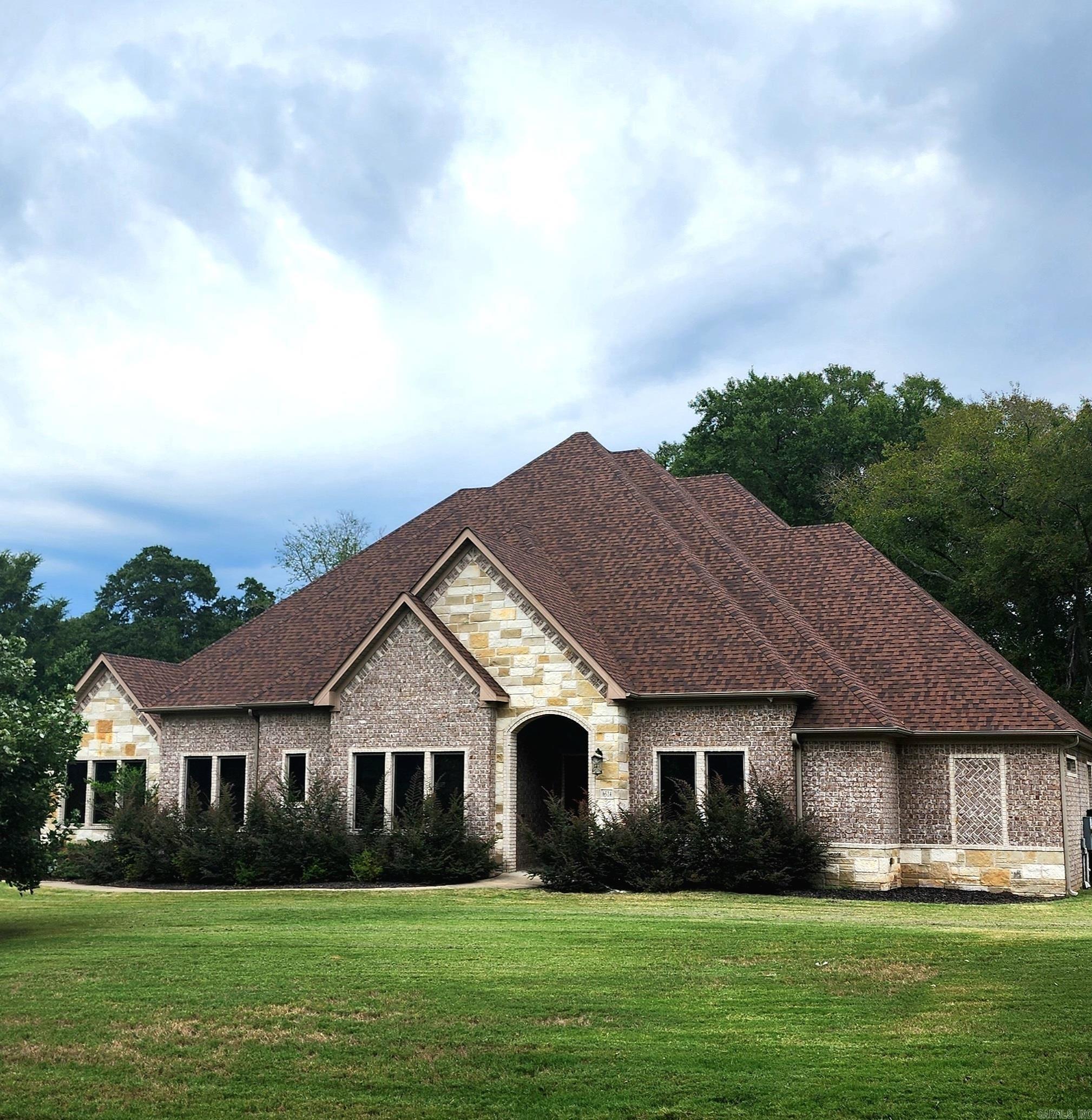 *Seller is offering $5K in Buyer concessions with an acceptable offer.* This is an amazing SINGLE level 5 bedroom and 4.5 bathroom home located on a large corner lot in Hurricane Lake Estates. This home has plenty of space to suit all of your needs. The living spaces is perfect for entertaining with an open floor plan flowing into the large kitchen. The sizable primary bedroom showcases a dream bathroom with a soaking tub, custom tiled shower, and a large walk-in closet with its own laundry room. Moreover, there are two bedrooms with their own bathrooms and two bedrooms that share a connected bathroom. This home has a NEW roof, NEW flooring, NEW hot water tank and updated kitchen counters/backsplash.