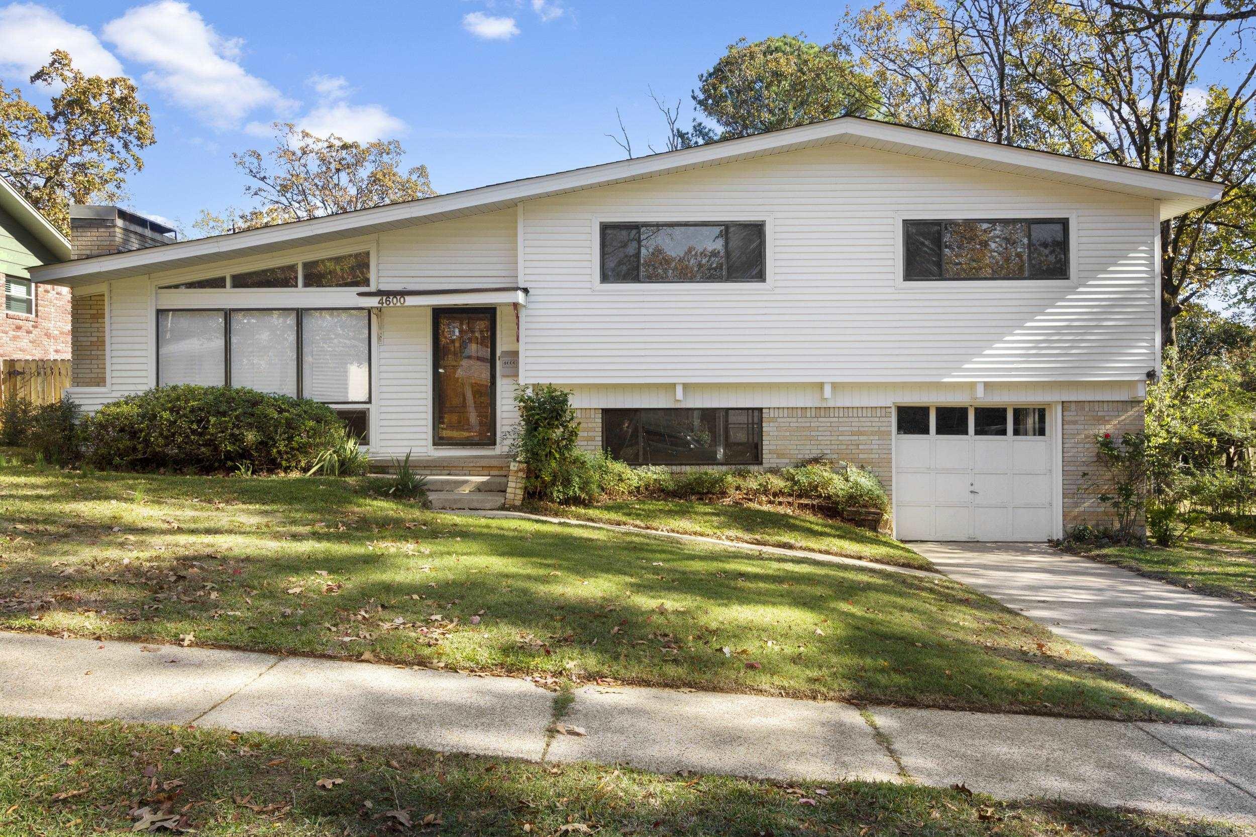 This charming 4-bedroom, 2.5-bathroom home, built in 1957, offers endless potential for those seeking to create their perfect sanctuary in a prime North Little Rock location. Situated in the desirable Lakewood Community, this spacious property features generous living areas with ample room for customization, allowing you to transform it into your dream home.  Outside, the large backyard offers opportunities for landscaping, gardening, or creating a private retreat. Located just moments away from shopping, dining, and entertainment, this home offers both convenience and the potential to build lasting equity through updates and renovations.  Don’t miss out on this "sweat equity" opportunity—perfect for those with vision and a passion for home improvement. Schedule your showing today and see the potential this home has to offer! Roof 2015. HVAC 2006. New cast-iron sewer lines 2003.