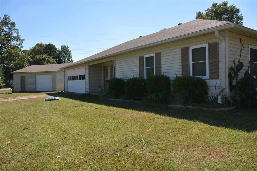 Great subdivision, minutes from Heber Springs with natural gas and cable internet, well maintained move in ready, 3 Bedrooms, 2 baths and 1424 square feet. updated with energy efficient vinyl windows, hardwood floors, tile counter tops and fresh paint. Enjoy the large kitchen & dining combo. 10x9 office with CH/A. There is a 24x24  detached shop, garage door and personnel door. Fenced yard, Just minutes from town and the lake. You will enjoy all the town amenities with out being right in town.