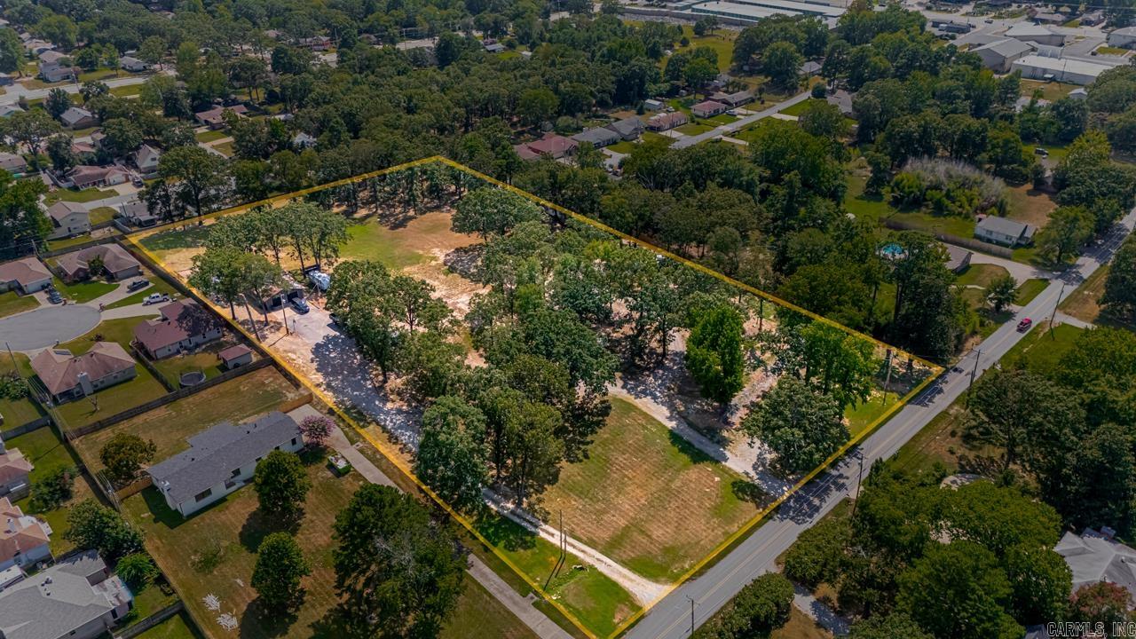 Rare opportunity to own 5 acres in the middle of Sherwood!! Perfect to build your dream home or an investor looking for development opportunity. All utilities on site already. There's a huge 30x40 shop on site as well as a small outbuilding on the property. Property also has special use permit from the city for the 6 stall RV/Mobile Home Park that's currently operating and income producing! Seller has made improvements to each stall recently with all updated utilities and pads. Must see to appreciate what all this property has to offer!